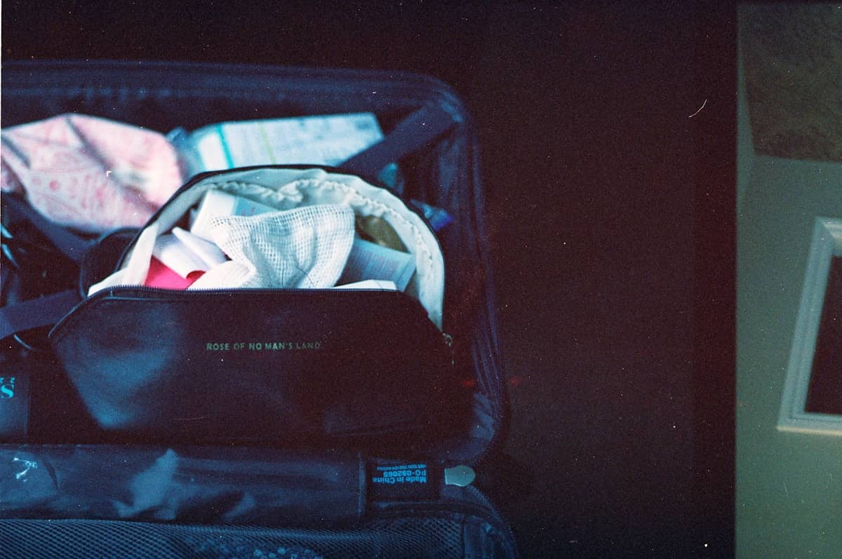 Packing cubes neatly organized inside an open suitcase