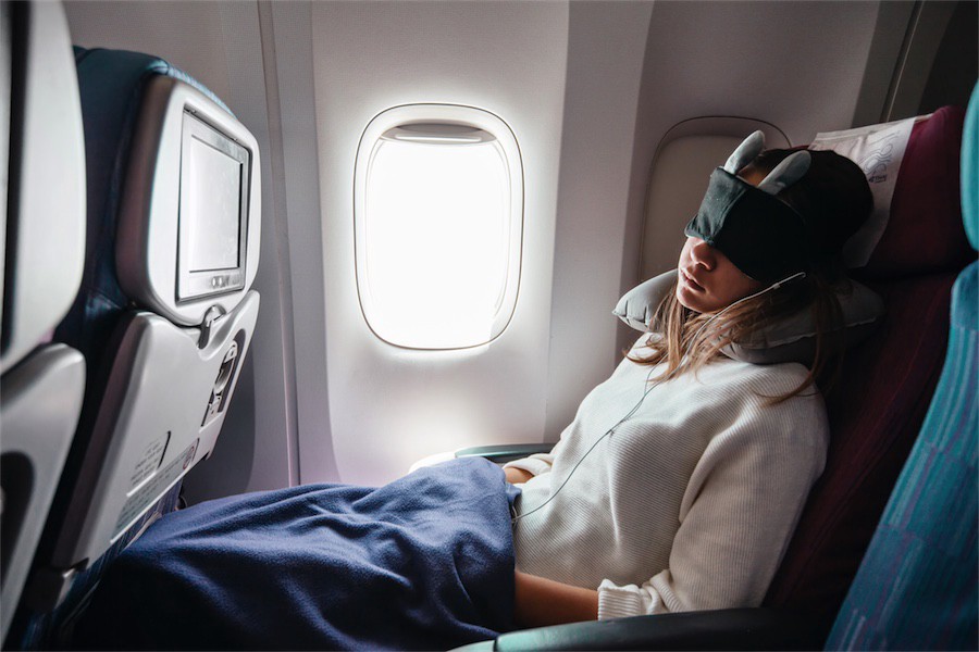 sleeping on plane with blackout sleep mask