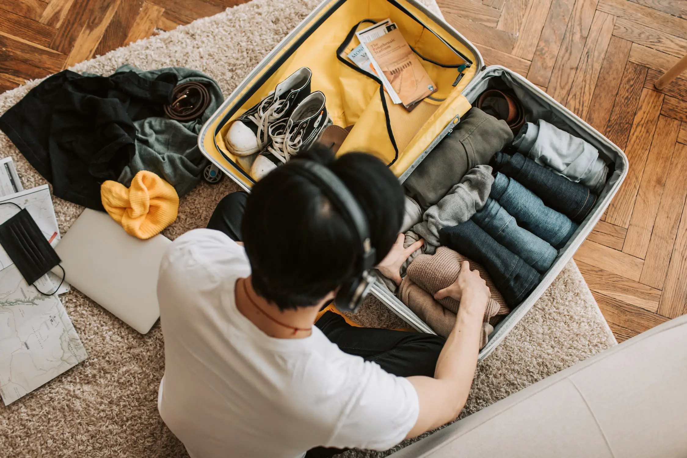 rolling vs folding clothes and suitcase packing