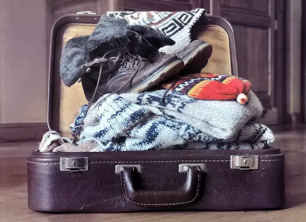 suitcase filled with clothes