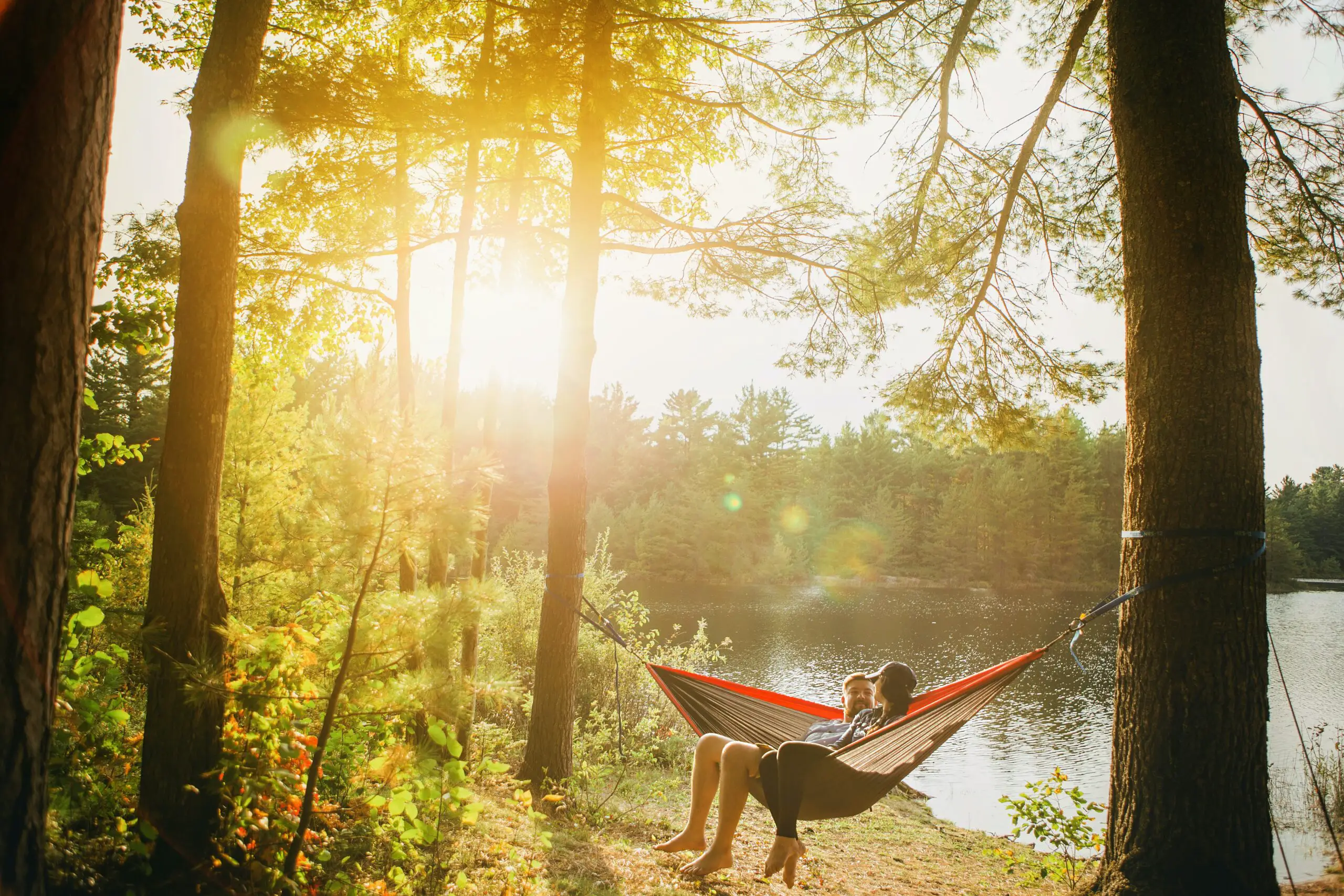 couple on a hammock while camping