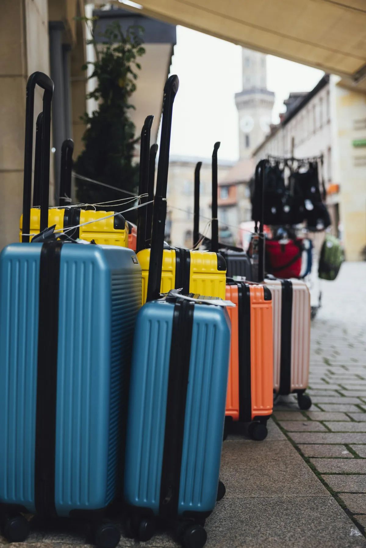 Suitcases lined up for cheapest luggage buying guide