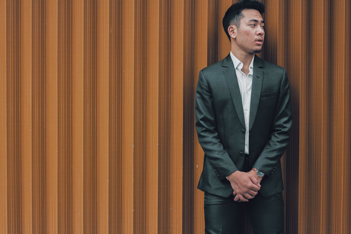 Business professional with garment bag traveling for work