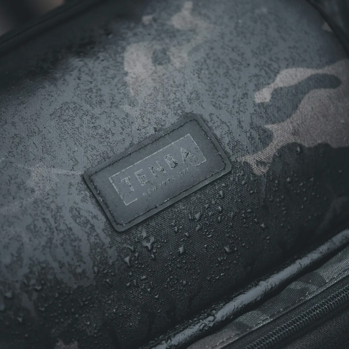 Weathered luggage on a baggage claim conveyor showing visible travel wear