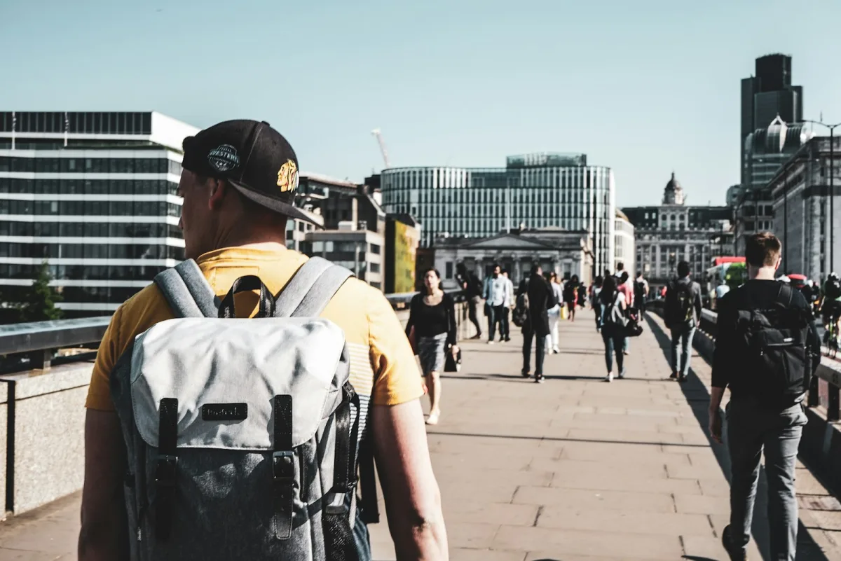 People walking toward an office building in the morning